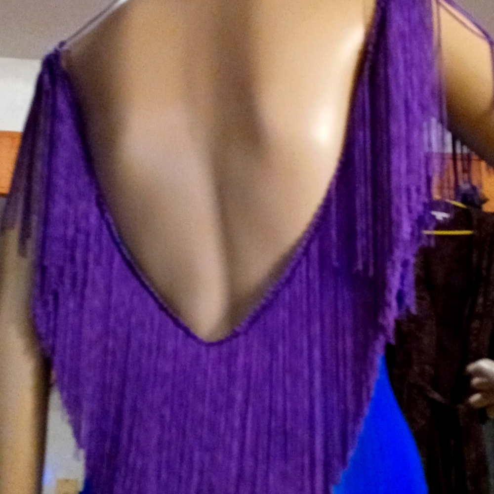 One sexy chefaun gown with backless sleevlesd fringe sz. 6